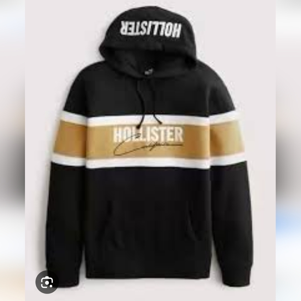 Hollister Co. men's pullover featuring a color-block design Black, Wqhite, Gold